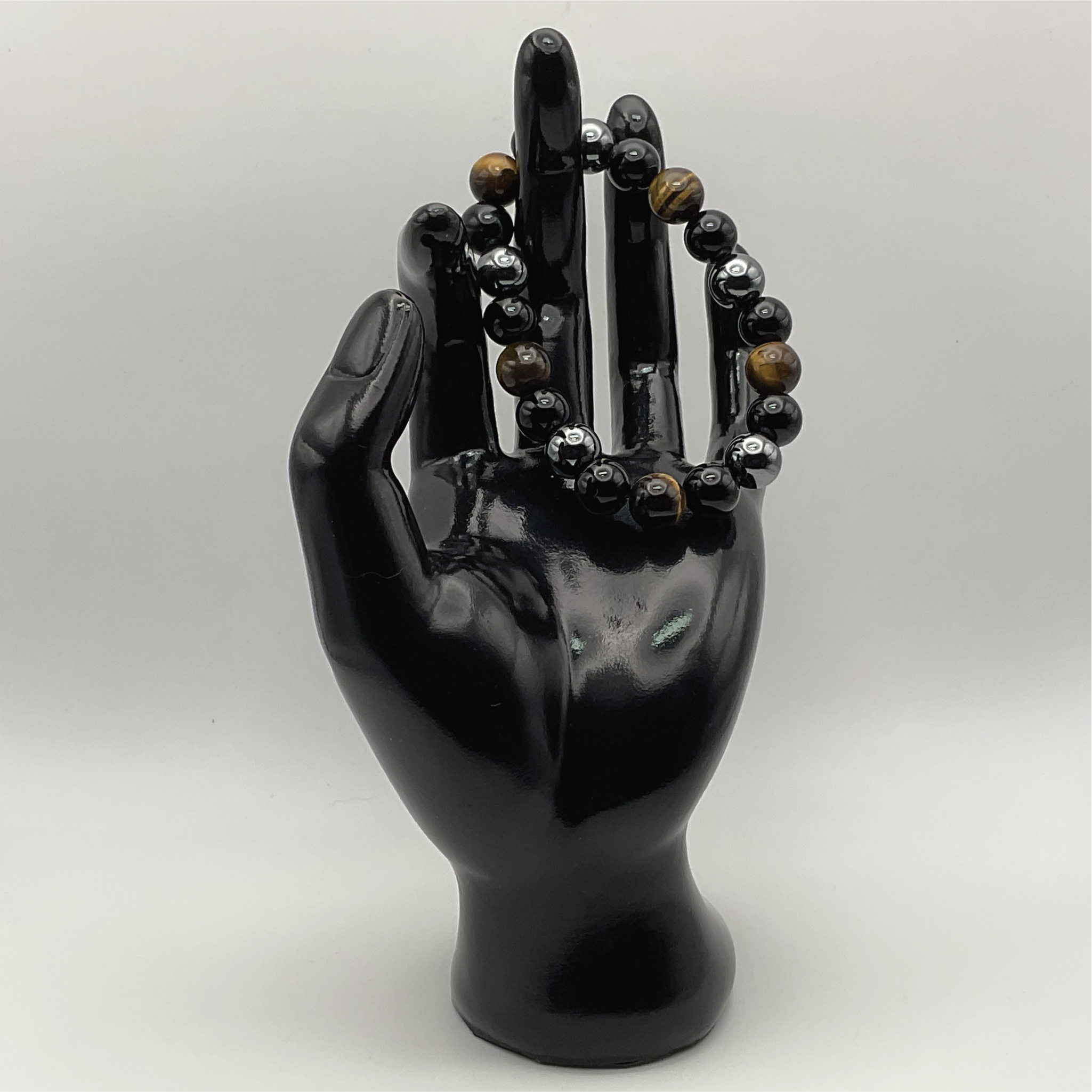 Pulsera de hematita, obsidiana negra y ojo de tigre