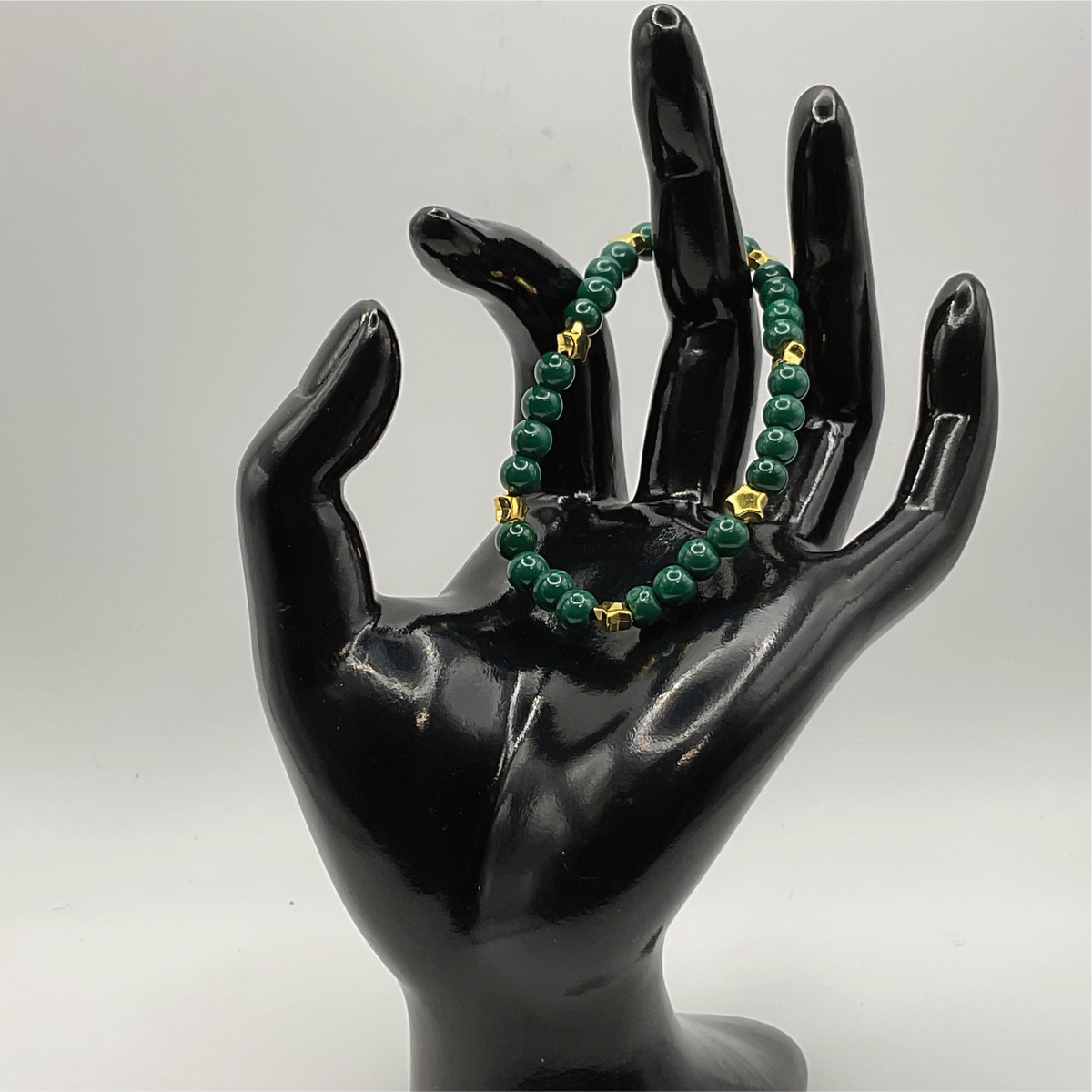 Dark Green Glass Bracelet with Gold Star Spacers