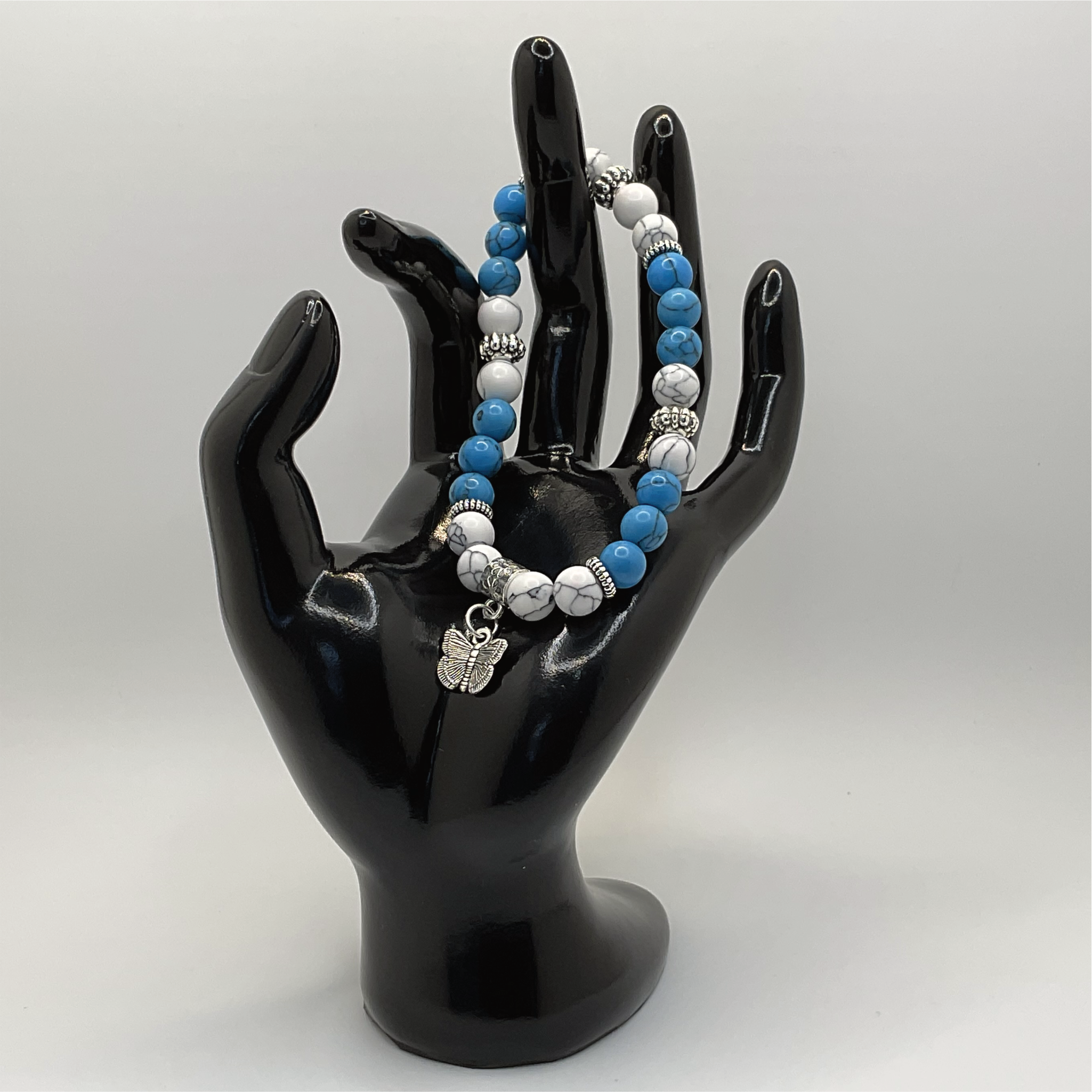Blue Howlite Magnesite Butterfly Charm Bracelet with Silver Spacers