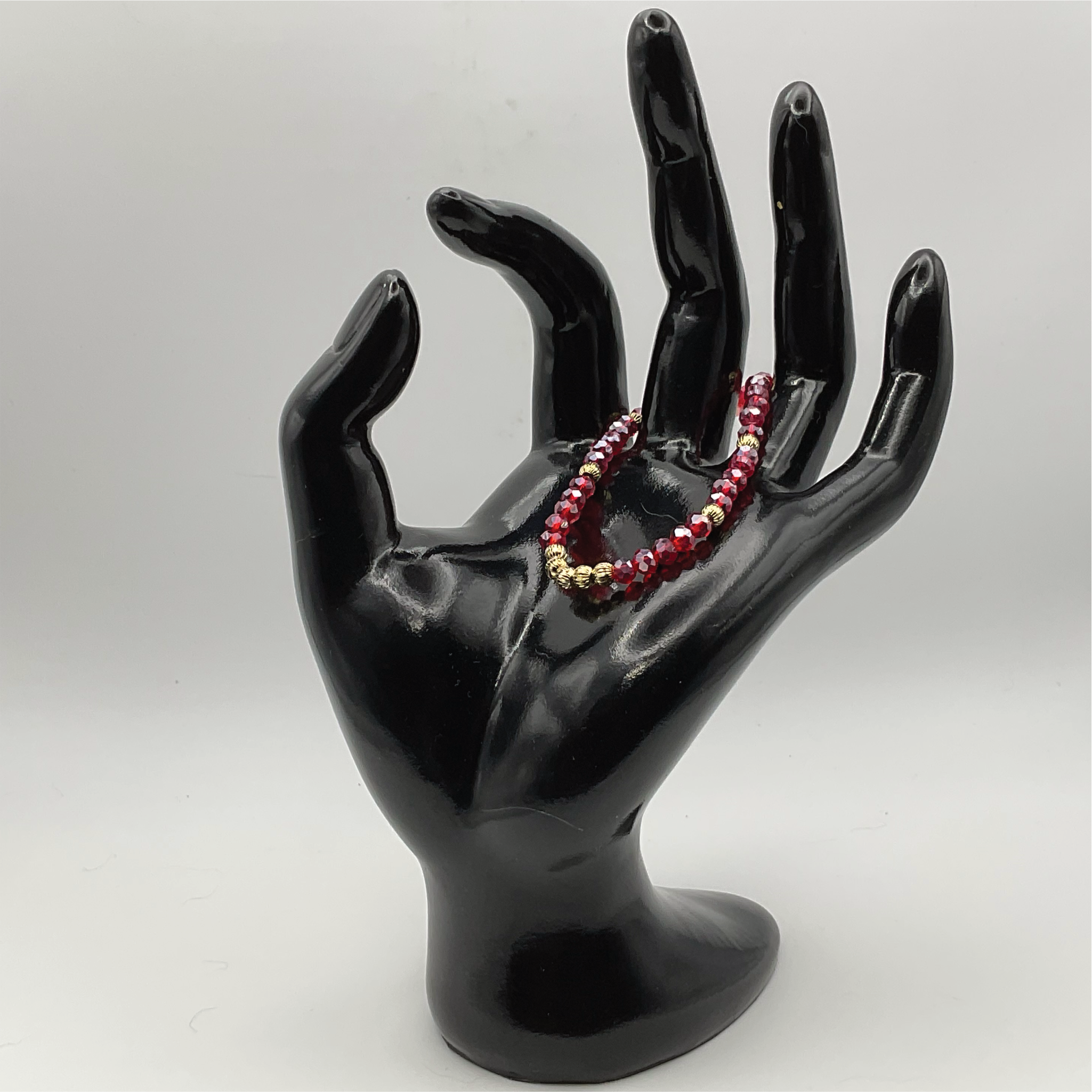 14.5 cm (5.7") Red Bracelet with Gold Spacers