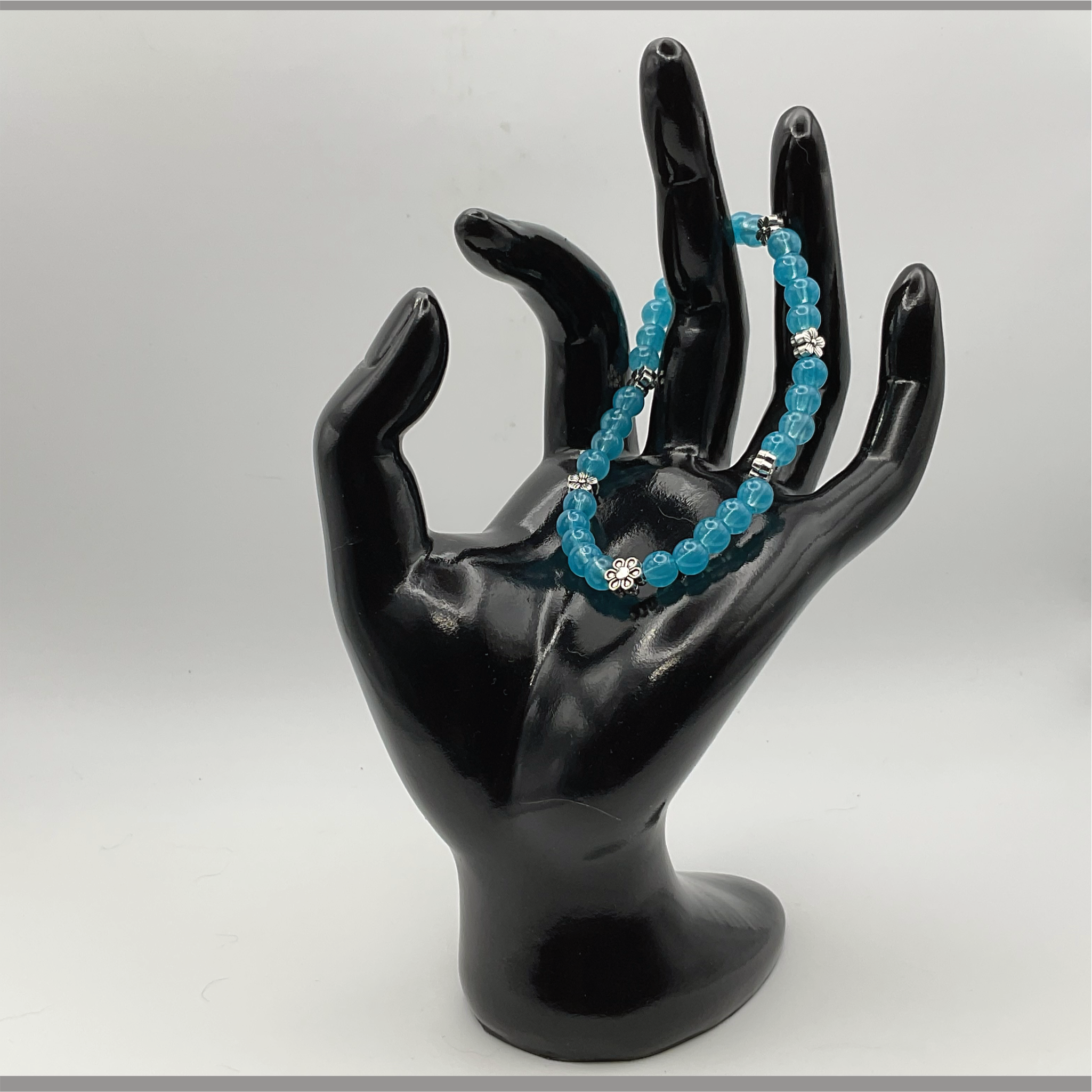 Teal Glass Bracelet with Silver Flower Spacers