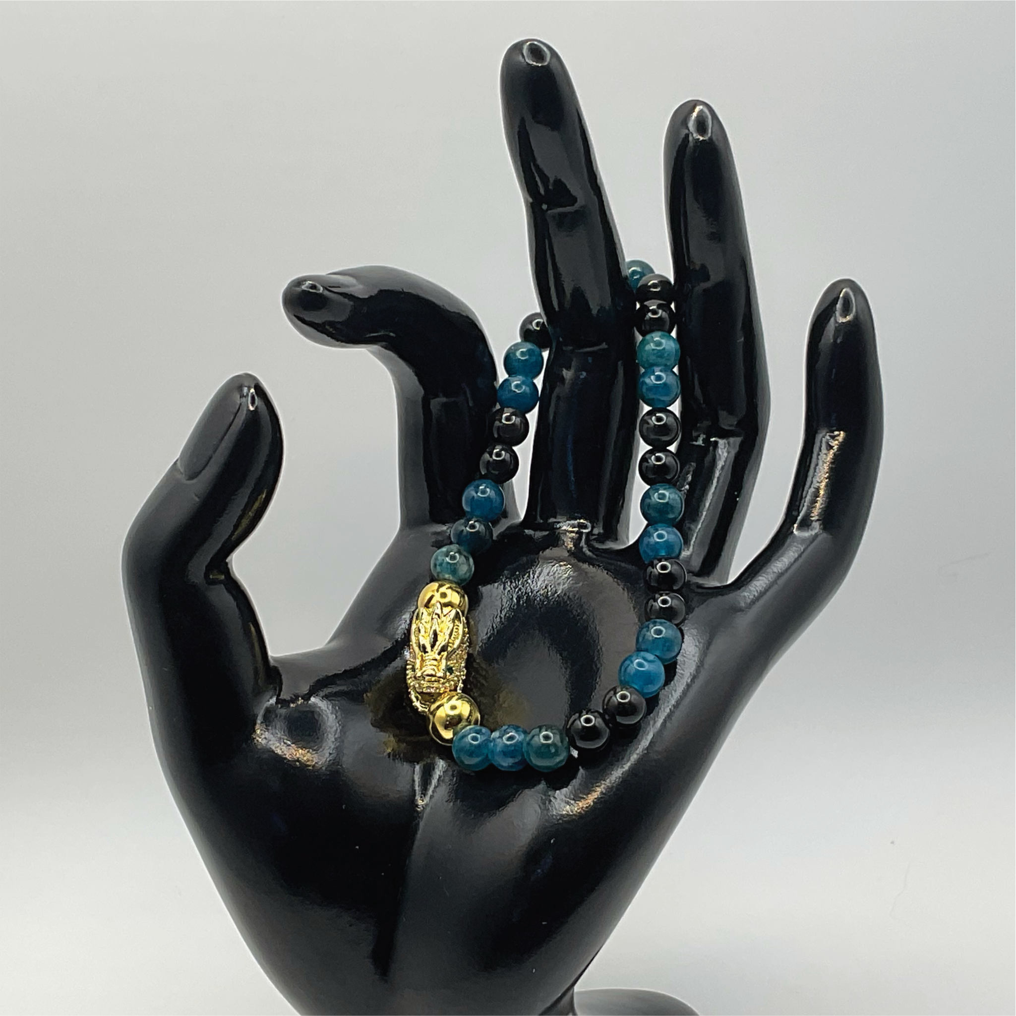 Blue Apatite Black Agate Dragon Charm Bracelet with Gold Tone Spacers